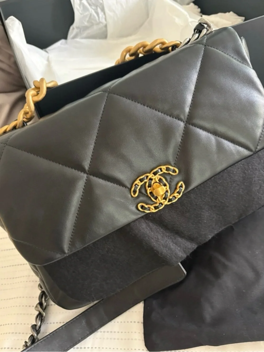 CHANEL Black Quilted Shoulder Bag with Gold Chain-Trim